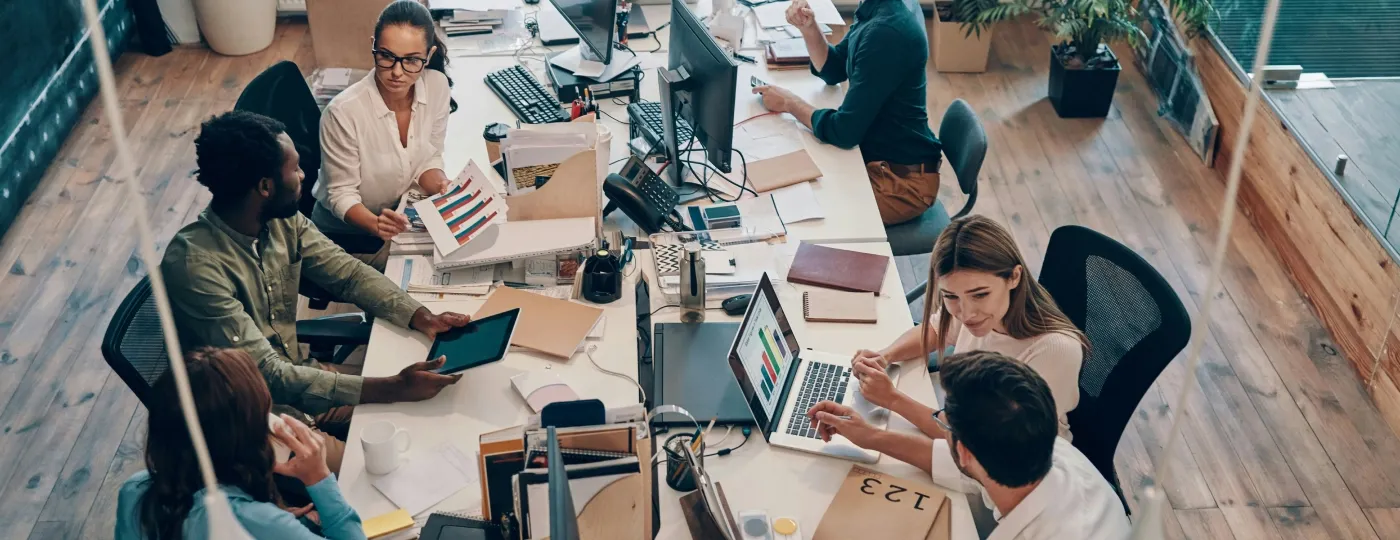 A team at their desks, working